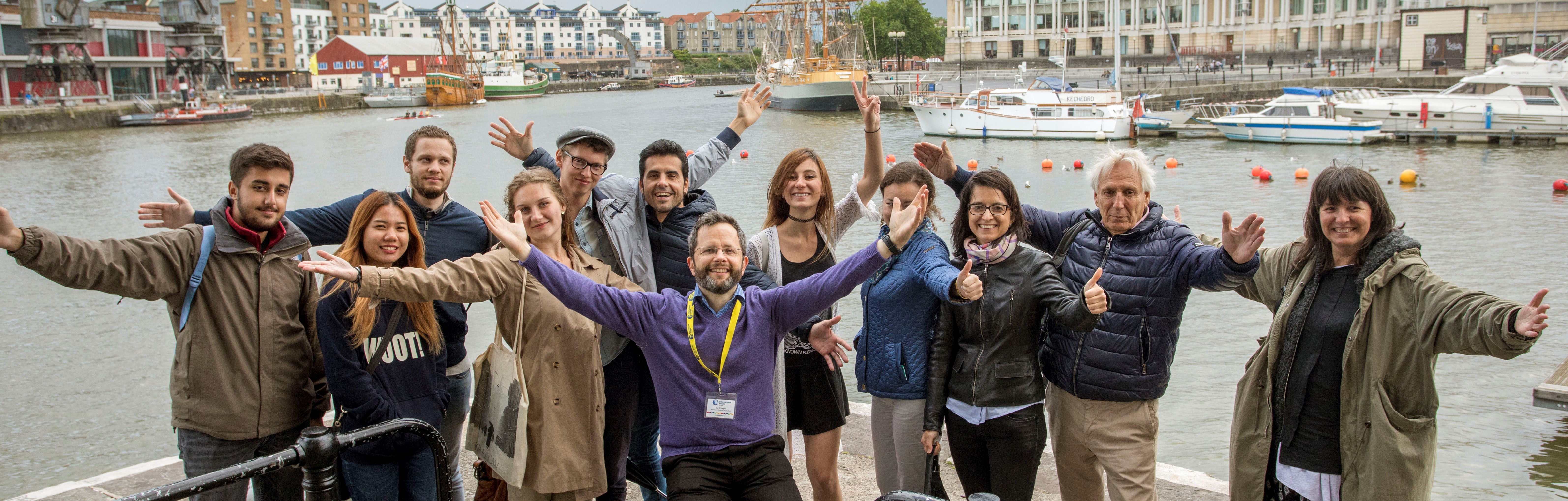 Teacher with group in Bristol harbour