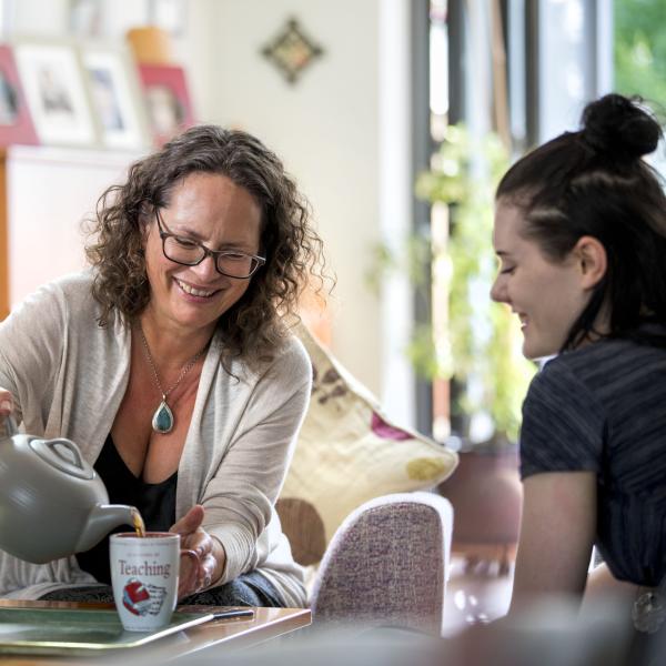 A homestay host and her student